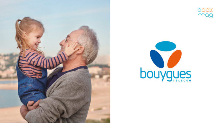 Grand-père souriant avec sa petite-fille sur la plage, logo Bouygues Telecom